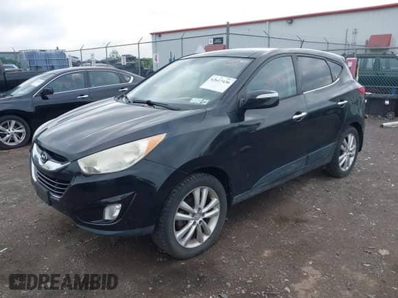 2010 Hyundai Tucson GLS with VIN KM8JUCAC0AU071627, listed as a IAAI auction lot 42617436 with 145,889 mi miles and . Bid and sale history available at DreamBid. Image 2.