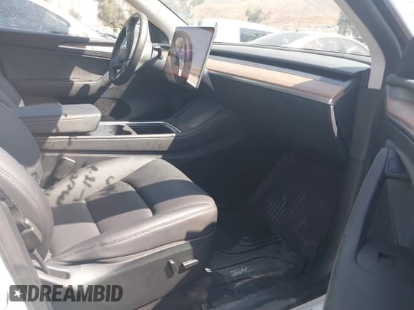 ✅ 2023 Tesla Model Y Long Range • VIN: 7SAYGDEE3PF897016 • Lot: 40407572. Listed on IAAI with 8,030 mi. Free auction sales archive from the USA and detailed vehicle history report at DreamBid. Image 5.