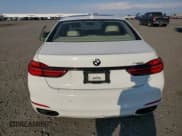 ✅ 2016 BMW 7 Series 740i • VIN: WBA7E2C52GG547305 • Лот: 80148255. Опубликован ранее на Copart с пробегом 99 952 миль. Бесплатный доступ к архиву аукционных продаж из США и подробный отчёт об истории автомобиля на DreamBid. Изображение 6.