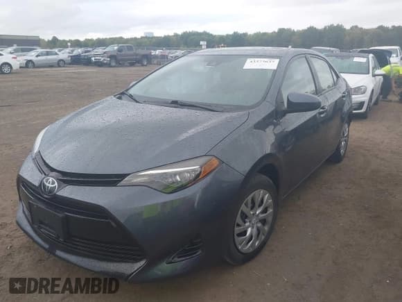 ✅ 2018 Toyota Corolla L • VIN: 2T1BURHEXJC077323 • Lot: 43373637. Listed on IAAI with 40,706 mi. Free auction sales archive from the USA and detailed vehicle history report at DreamBid. Image 2.