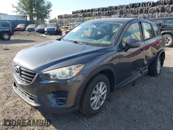 ✅ 2016 Mazda CX-5 Sport • VIN: JM3KE4BY2G0653564 • Lot: 43091117. Wystawiony na IAAI z przebiegiem 120 383 mil. Bezpłatny archiwum sprzedaży aukcyjnych z USA i szczegółowy raport historii pojazdu na DreamBid. Zdjęcie 17.