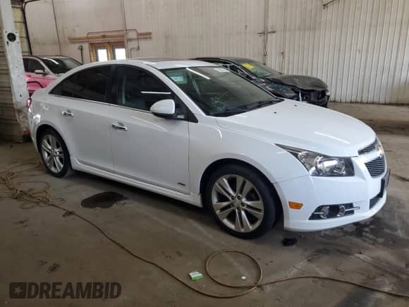 2014 Chevrolet Cruze LTZ with VIN 1G1PG5SB4E7354584, listed as a Copart auction lot 70657045 with 118,174 mi miles and Salvage title. Bid and sale history available at DreamBid. Image 4.