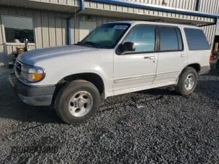 ✅ 1999 Ford Explorer XL • VIN: 1FMZU34XXXUB80803 • Lot: 87027834. Listed on Copart with 222,864 mi. Free auction sales archive from the USA and detailed vehicle history report at DreamBid. Image 1.