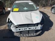 ✅ 2015 Ford Focus Titanium • VIN: 1FADP3J23FL383637 • Lot: 40657717. Wystawiony na IAAI z przebiegiem 92 490 mil. Bezpłatny archiwum sprzedaży aukcyjnych z USA i szczegółowy raport historii pojazdu na DreamBid. Zdjęcie 6.