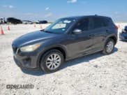 ✅ 2014 Mazda CX-5 Sport • VIN: JM3KE2BE5E0386119 • Lot: 68226855. Listed on Copart with 310,877 mi. Free auction sales archive from the USA and detailed vehicle history report at DreamBid. Image 1.