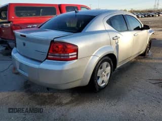✅ 2010 Dodge Avenger SXT • VIN: 1B3CC4FB4AN105974 • Лот: 79948744. Опубликован ранее на Copart с пробегом 153 467 миль. Бесплатный доступ к архиву аукционных продаж из США и подробный отчёт об истории автомобиля на DreamBid. Изображение 3.