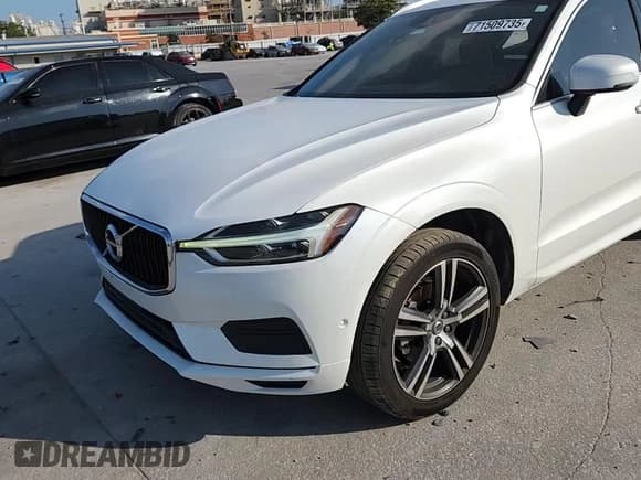 ✅ 2019 Volvo XC60 Momentum • VIN: LYV102DK9KB252010 • Lot: 71509735. Listed on Copart with 95,731 mi. Free auction sales archive from the USA and detailed vehicle history report at DreamBid. Image 14.
