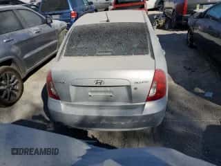 2007 Hyundai Accent GLS z VIN KMHCN46CX7U102105, wystawiony jako Copart lot #65793504 z przebiegiem 213 972 mil mil oraz Szkoda całkowita • Salvage title. Historia ofert i sprzedaży dostępna na DreamBid. Obrazek 6.