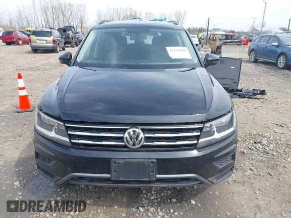 ✅ 2021 Volkswagen Tiguan SE • VIN: 3VV2B7AX4MM050282 • Лот: 42124808. Опубликован ранее на IAAI с пробегом 80 082 миль. Бесплатный доступ к архиву аукционных продаж из США и подробный отчёт об истории автомобиля на DreamBid. Изображение 13.