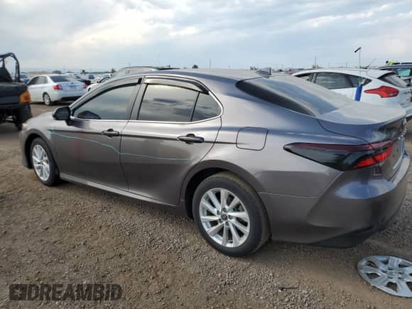 2023 Toyota Camry LE с VIN 4T1C11BK7PU088073, выставлен на аукционе Copart как лот 71361935 с пробегом 24 003 миль миль и Списание • Salvage title. История ставок и продаж доступна на DreamBid. Изображение 2.