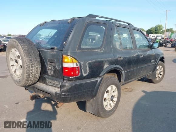 ✅ 1998 Honda Passport LX • VIN: 4S6CM58WXW4403219 • Lot: 42715922. Listed on IAAI with 153,181 mi. Free auction sales archive from the USA and detailed vehicle history report at DreamBid. Image 4.