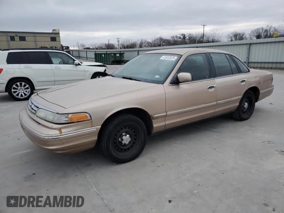 ✅ 1996 Ford Crown Victoria • VIN: 2FALP73W9TX212392 • Lot: 41832525. Listed on Copart with 114,690 mi. Free auction sales archive from the USA and detailed vehicle history report at DreamBid. Image 1.
