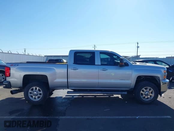 ✅ 2015 Chevrolet Silverado 2500HD LT • VIN: 1GC1KVE83FF653342 • Lot: 41970275. Listed on IAAI with 130,535 mi. Free auction sales archive from the USA and detailed vehicle history report at DreamBid. Image 14.