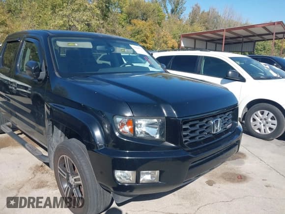 ✅ 2014 Honda Ridgeline Sport • VIN: 5FPYK1F72EB012416 • Lot: 43694778. Listed on IAAI with 177,377 mi. Free auction sales archive from the USA and detailed vehicle history report at DreamBid. Image 6.