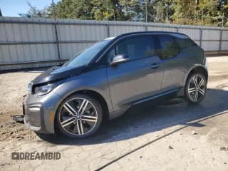 ✅ 2018 BMW i3 • VIN: WBY7Z4C56JVC34426 • Лот: 86874505. Опубликован ранее на Copart с пробегом 75 659 миль. Бесплатный доступ к архиву аукционных продаж из США и подробный отчёт об истории автомобиля на DreamBid. Изображение 1.