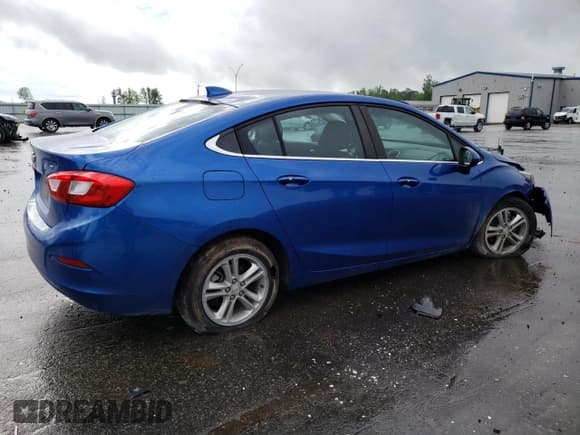 ✅ 2017 Chevrolet Cruze LT • VIN: 1G1BE5SM2H7147682 • Lot: 48377893. Listed on Copart with 63,423 mi. Free auction sales archive from the USA and detailed vehicle history report at DreamBid. Image 3.
