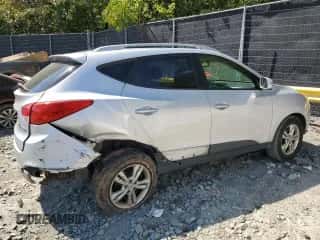 2013 Hyundai Tucson GLS z VIN KM8JU3AC8DU550995, wystawiony jako Copart lot #70293494 z przebiegiem 175 354 mil mil oraz Szkoda całkowita • Salvage title. Historia ofert i sprzedaży dostępna na DreamBid. Obrazek 3.