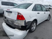 ✅ 2005 Ford Focus S • VIN: 1FAFP34N95W195622 • Lot: 43724712. Listed on IAAI with Not provided. Free auction sales archive from the USA and detailed vehicle history report at DreamBid. Image 4.