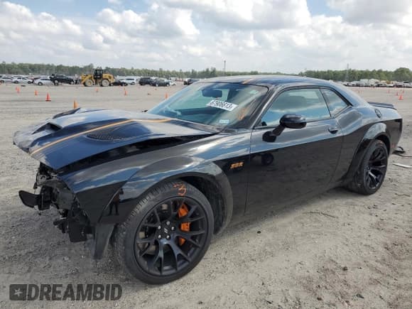 ✅ 2022 Dodge Challenger R/T Scat Pack Widebody • VIN: 2C3CDZFJ7NH122528 • Lot: 67906613. Listed on Copart with 12,809 mi. Free auction sales archive from the USA and detailed vehicle history report at DreamBid. Image 1.