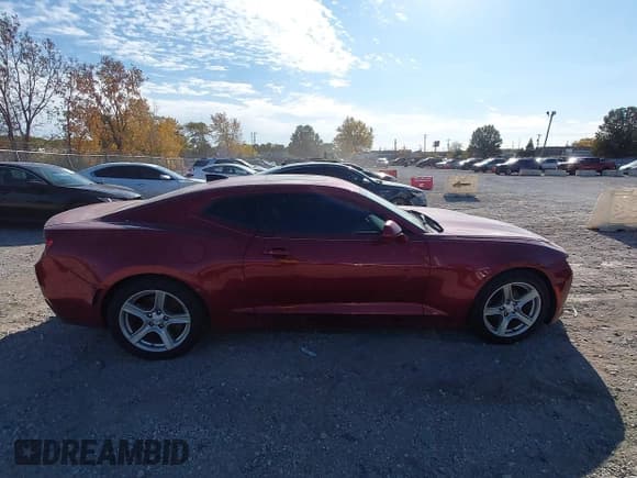 ✅ 2017 Chevrolet Camaro 1LT • VIN: 1G1FB1RX4H0115831 • Lot: 43622231. Listed on IAAI with 107,260 mi. Free auction sales archive from the USA and detailed vehicle history report at DreamBid. Image 13.