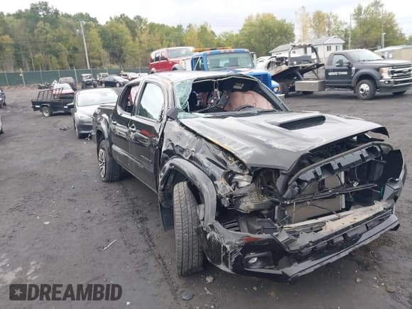 ✅ 2023 Toyota Tacoma SR • VIN: 3TMCZ5AN9PM636854 • Lot: 43298762. Listed on IAAI with 22,831 mi. Free auction sales archive from the USA and detailed vehicle history report at DreamBid. Image 11.