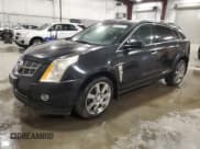 ✅ 2012 Cadillac SRX Premium Collection • VIN: 3GYFNFE32CS565486 • Lot: 85420195. Wystawiony na Copart z przebiegiem Nie podano. Bezpłatny archiwum sprzedaży aukcyjnych z USA i szczegółowy raport historii pojazdu na DreamBid. Zdjęcie 1.