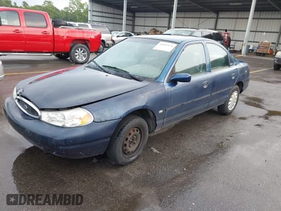 ✅ 1998 Ford Contour • VIN: 3FAFP663XWM122628 • Lot: 42692574. Listed on IAAI with 227,055 mi. Free auction sales archive from the USA and detailed vehicle history report at DreamBid. Image 2.