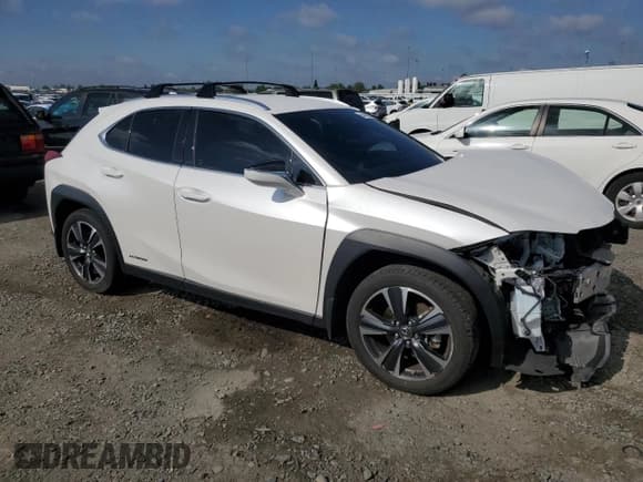 ✅ 2021 Lexus UX 250h • VIN: JTHX9JBH6M2052870 • Lot: 54749535. Listed on Copart with 62,800 mi. Free auction sales archive from the USA and detailed vehicle history report at DreamBid. Image 4.