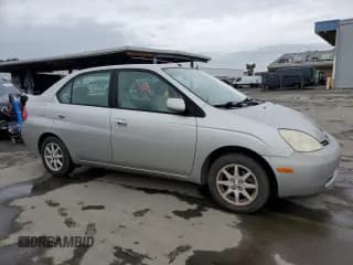 ✅ 2003 Toyota Prius • VIN: JT2BK18U030085144 • Lot: 86376474. Listed on Copart with 165,000 mi. Free auction sales archive from the USA and detailed vehicle history report at DreamBid. Image 4.