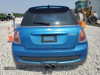 2007 MINI Hardtop S with VIN WMWMF73547TT84449, listed as a Copart auction lot 60490995 with 157,602 mi miles and Salvage title. Bid and sale history available at DreamBid. Image 6.