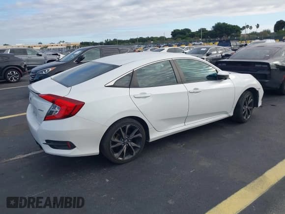 ✅ 2019 Honda Civic Sport • VIN: 19XFC2F85KE031815 • Lot: 43543663. Listed on IAAI with 94,336 mi. Free auction sales archive from the USA and detailed vehicle history report at DreamBid. Image 4.
