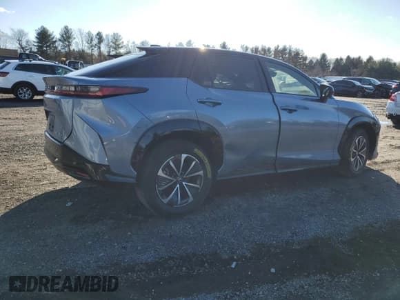 ✅ 2023 Lexus RZ 450e Premium • VIN: JTJAAAAB3PA004777 • Lot: 86450044. Wystawiony na Copart z przebiegiem 37 919 mil. Bezpłatny archiwum sprzedaży aukcyjnych z USA i szczegółowy raport historii pojazdu na DreamBid. Zdjęcie 3.