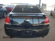 ✅ 2014 Chevrolet Impala LT • VIN: 2G1WB5E39E1121571 • Лот: 70295884. Опубликован ранее на Copart с пробегом 51 427 миль. Бесплатный доступ к архиву аукционных продаж из США и подробный отчёт об истории автомобиля на DreamBid. Изображение 6.