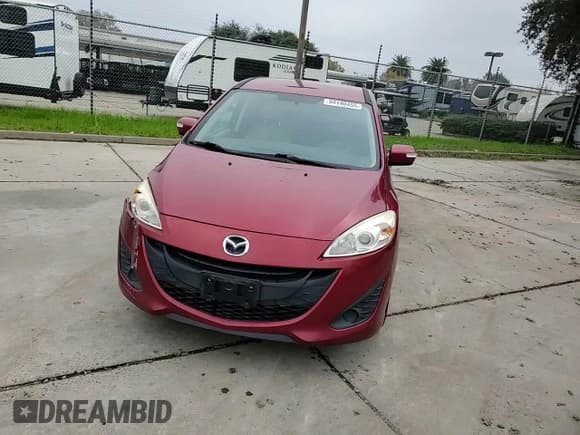 ✅ 2015 Mazda 5 Sport • VIN: JM1CW2BL7F0184828 • Лот: 94140455. Опубликован ранее на Copart с пробегом 94 378 миль. Бесплатный доступ к архиву аукционных продаж из США и подробный отчёт об истории автомобиля на DreamBid. Изображение 14.