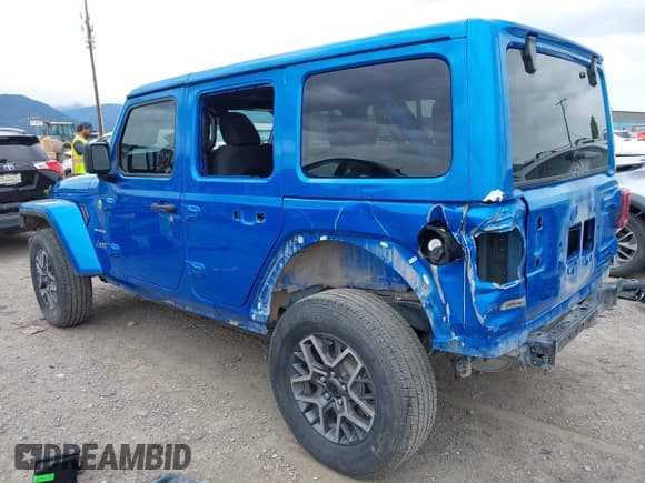 ✅ 2024 Jeep Wrangler Sahara • VIN: 1C4PJXEG0RW344058 • Lot: 42261013. Listed on IAAI with 20,040 mi. Free auction sales archive from the USA and detailed vehicle history report at DreamBid. Image 3.