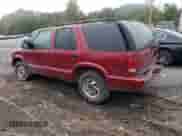 2002 Chevrolet Blazer LS z VIN 1GNDT13W32K241483, wystawiony jako Copart lot #73992044 z przebiegiem 191 544 mil mil oraz Szkoda całkowita • Salvage title. Historia ofert i sprzedaży dostępna na DreamBid. Obrazek 2.