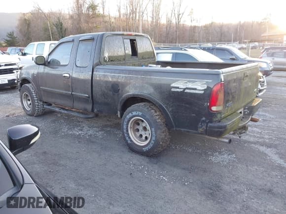 ✅ 1999 Ford F-150 • VIN: 1FTRX18W5XNA56112 • Lot: 43812267. Wystawiony na IAAI z przebiegiem Nie podano. Bezpłatny archiwum sprzedaży aukcyjnych z USA i szczegółowy raport historii pojazdu na DreamBid. Zdjęcie 3.