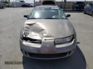 ✅ 1999 Saturn SC • VIN: 1G8ZN1288XZ310351 • Лот: 76677414. Опубликован ранее на Copart с пробегом Не указан. Бесплатный доступ к архиву аукционных продаж из США и подробный отчёт об истории автомобиля на DreamBid. Изображение 5.