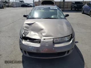 ✅ 1999 Saturn SC • VIN: 1G8ZN1288XZ310351 • Лот: 76677414. Опубликован ранее на Copart с пробегом Не указан. Бесплатный доступ к архиву аукционных продаж из США и подробный отчёт об истории автомобиля на DreamBid. Изображение 5.