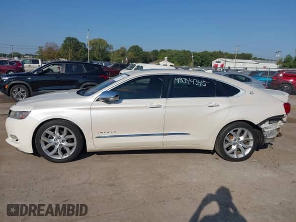 2014 Chevrolet Impala LTZ with VIN 1G1155S32EU122071, listed as a IAAI auction lot 43344345 with 151,734 mi miles and . Bid and sale history available at DreamBid. Image 15.