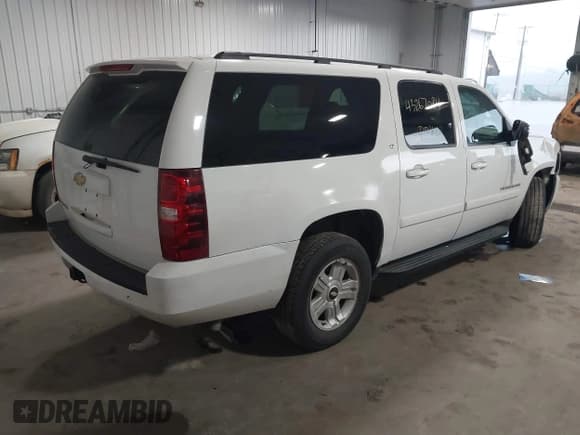 ✅ 2007 Chevrolet Suburban LT • VIN: 1GNFK16397J300658 • Lot: 43267084. Listed on IAAI with 201,521 mi. Free auction sales archive from the USA and detailed vehicle history report at DreamBid. Image 4.