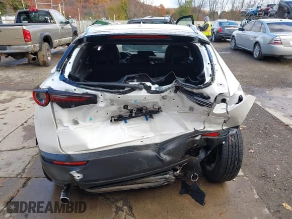 ✅ 2024 Mazda CX-30 S Premium • VIN: 3MVDMBDM2RM675517 • Lot: 43660173. Listed on IAAI with 15,539 mi. Free auction sales archive from the USA and detailed vehicle history report at DreamBid. Image 6.