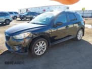 ✅ 2013 Mazda CX-5 Grand Touring • VIN: JM3KE2DE5D0130378 • Lot: 43388936. Wystawiony na IAAI z przebiegiem Nie podano. Bezpłatny archiwum sprzedaży aukcyjnych z USA i szczegółowy raport historii pojazdu na DreamBid. Zdjęcie 2.
