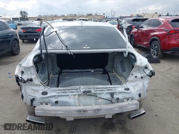 ✅ 2021 Acura TLX • VIN: 19UUB5F30MA003041 • Lot: 43726690. Listed on IAAI with 52,355 mi. Free auction sales archive from the USA and detailed vehicle history report at DreamBid. Image 17.