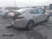 ✅ 2025 Mazda 3 S Preferred • VIN: JM1BPACM7S1774414 • Lot: 43215654. Listed on IAAI with 21,660 mi. Free auction sales archive from the USA and detailed vehicle history report at DreamBid. Image 4.