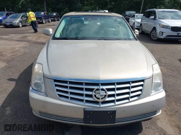 ✅ 2009 Cadillac DTS 1SA • VIN: 1G6KD57Y59U132055 • Lot: 42745799. Wystawiony na IAAI z przebiegiem 161 560 mil. Bezpłatny archiwum sprzedaży aukcyjnych z USA i szczegółowy raport historii pojazdu na DreamBid. Zdjęcie 6.