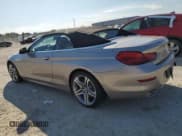 ✅ 2016 BMW 6 Series 650i xDrive • VIN: WBA6F7C58GD930527 • Лот: 75090894. Опубликован ранее на Copart с пробегом 25 200 миль. Бесплатный доступ к архиву аукционных продаж из США и подробный отчёт об истории автомобиля на DreamBid. Изображение 2.