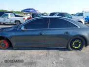 ✅ 2015 Audi S8 • VIN: WAUK2AFD5FN021986 • Лот: 41986491. Опубликован ранее на IAAI с пробегом 142 073 миль. Бесплатный доступ к архиву аукционных продаж из США и подробный отчёт об истории автомобиля на DreamBid. Изображение 14.