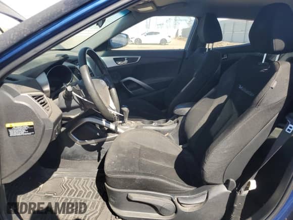 ✅ 2016 Hyundai Veloster • VIN: KMHTC6AD9GU283182 • Лот: 76103054. Размещён на Copart с пробегом 76 885 миль миль. Получите бесплатный доступ к архиву аукционных продаж из США и посмотрите подробный отчёт об истории автомобиля на DreamBid. Изображение 7.