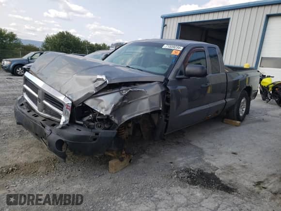 2005 Dodge Dakota SLT с VIN 1D7HW42N05S315223, выставлен на аукционе Copart как лот 71559234 с пробегом 127 204 миль миль и Списание • Salvage title. История ставок и продаж доступна на DreamBid. Изображение 1.